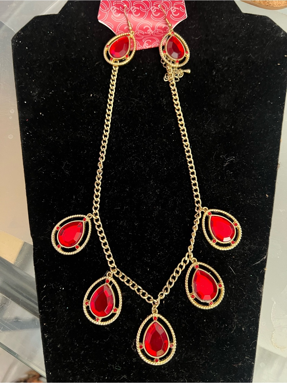 Charming Charlie Gold-Tone Necklace with Red Teardrop Accents